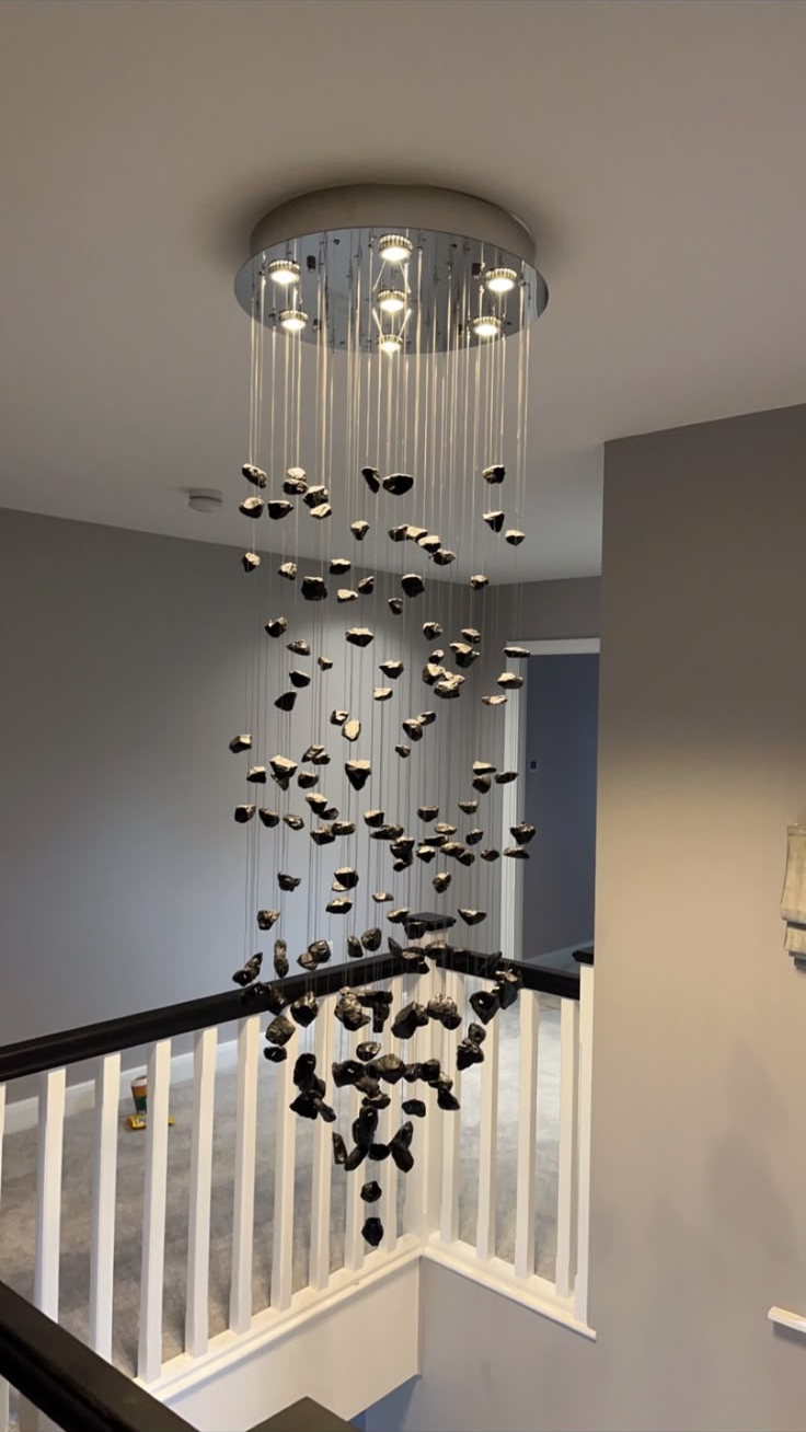 Feature chandelier installation by electrician in Blackpool